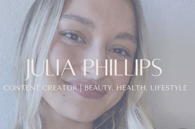 Julia Phillips showing her face. She's blonde with brown eyes. Overlayed over her picture is her name and what she does: content creator for beauty, health, and lifestyle.