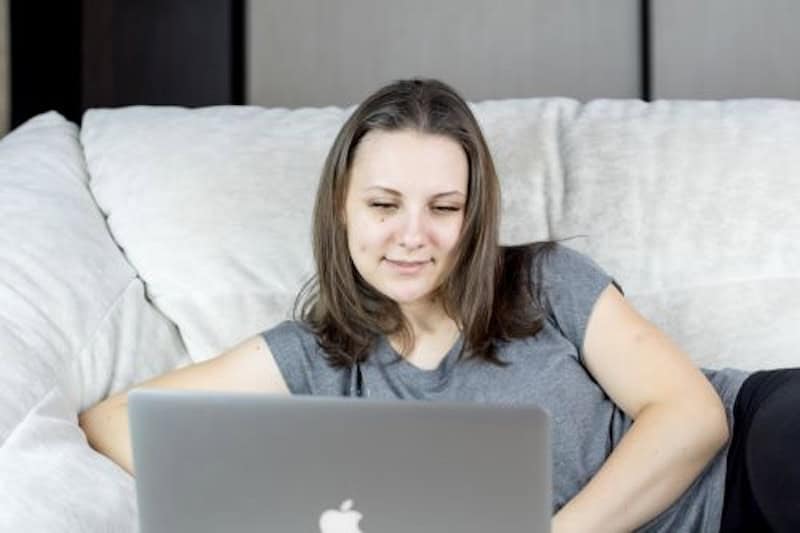 A woman looking up what flips online. 