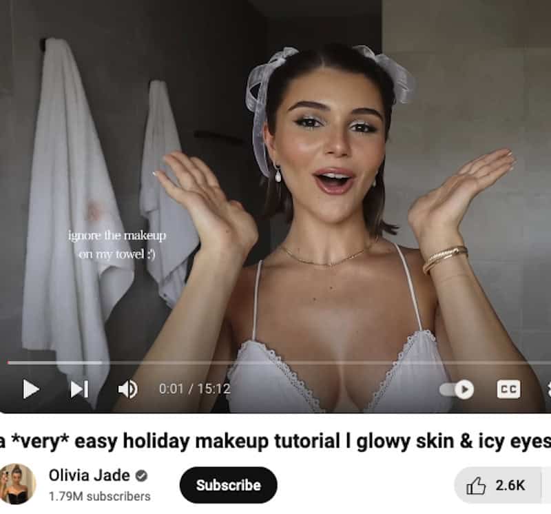Olivia Jade showing how she completes a makeup look while in her bathroom.
