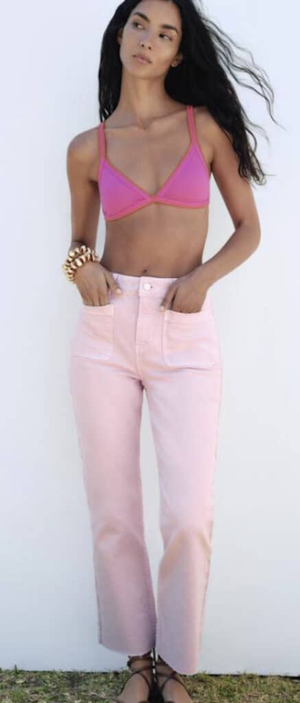 Zara model wearing pink pants. 