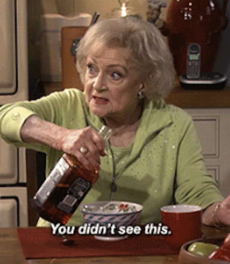 Betty White pouring liquor in her breakfast. 