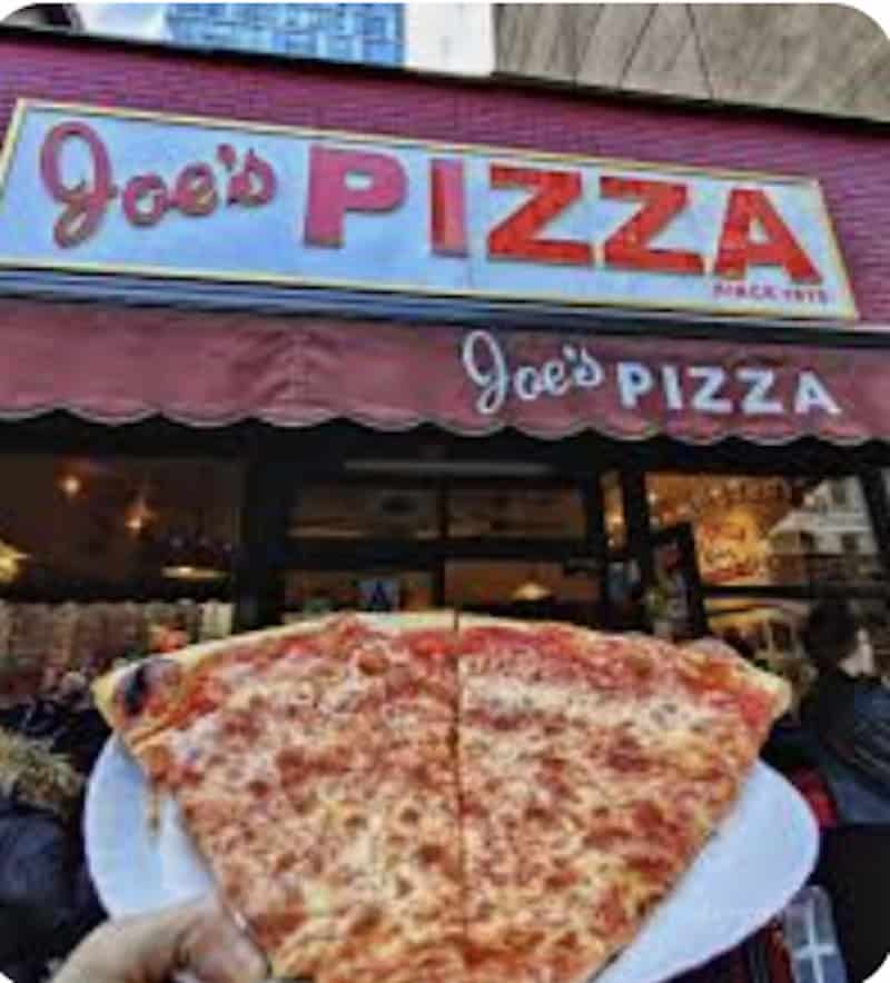 A delicious slice of Joe's Pizza in New York City. 